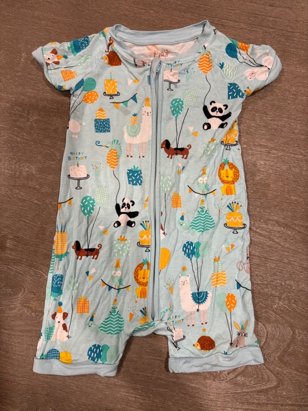 Little Sleepies Light Blue Zip Romper with birthday party Print